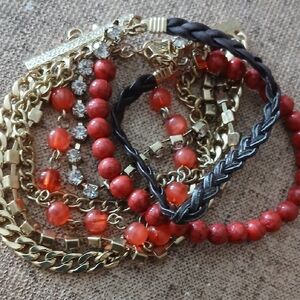 Elegant Gold and Red Bracelet Collection